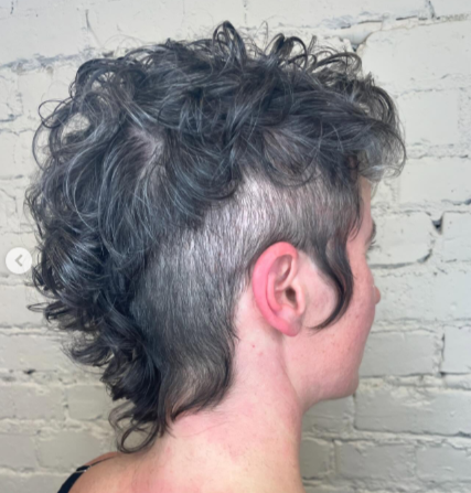 Asymmetrical mullet fade faux hawk