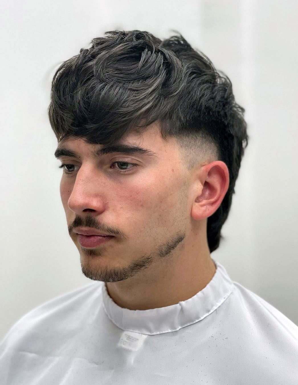 Modern Mullet Fade wavy hair