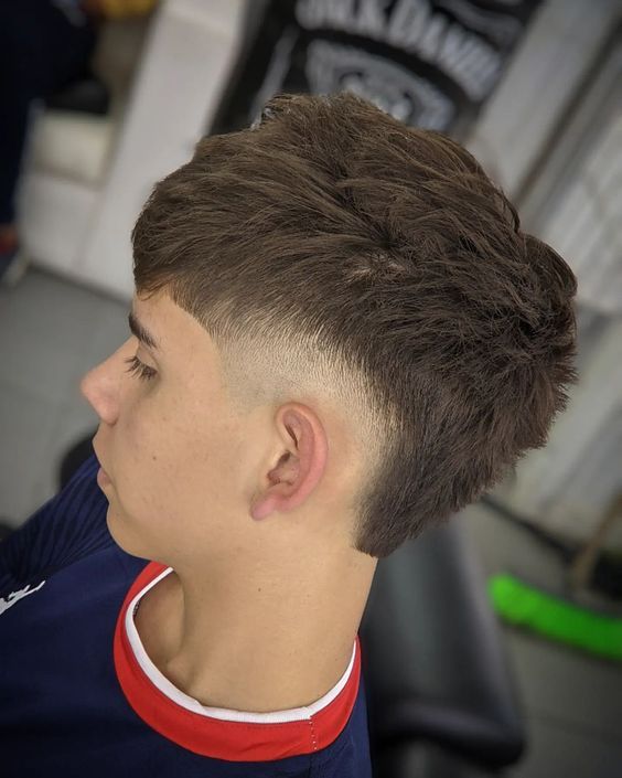 Vintage Mullet Fade with high fade and textured top
