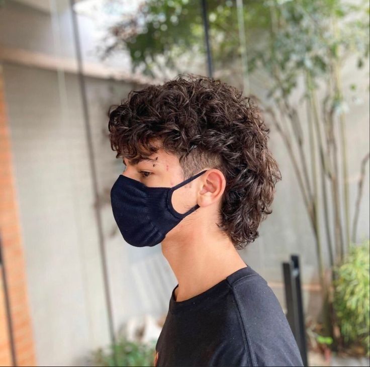 curly mullet fade hairstyle men