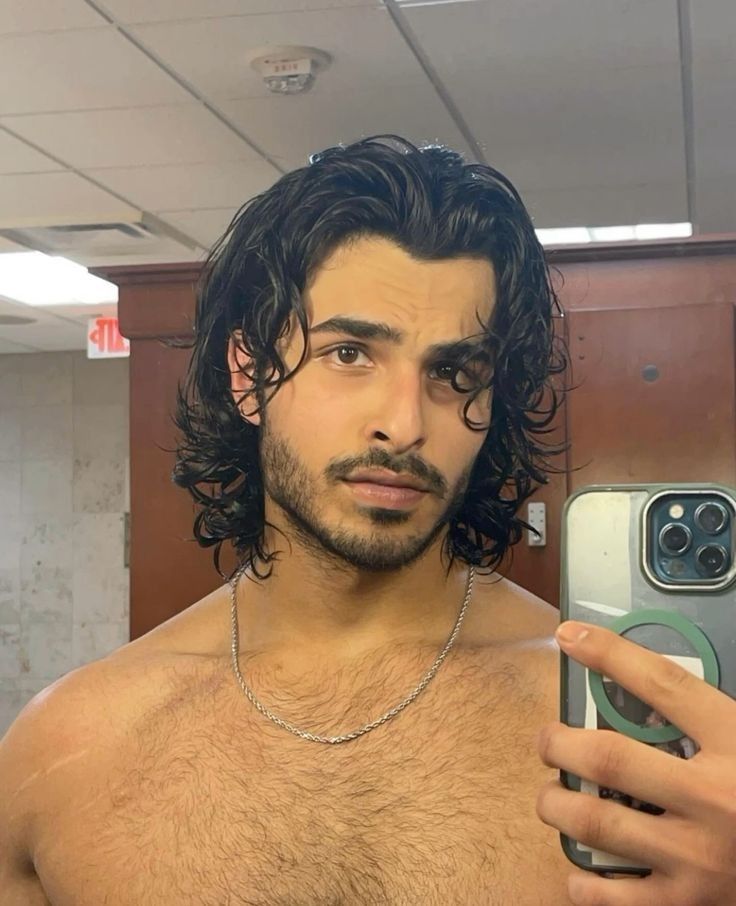 wolf cut male curly hair
